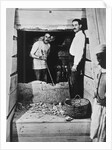 Howard Carter and a colleague excavating a tomb in the Valley of the Kings by Harry Burton