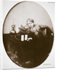 Thomas Alva Edison, American inventor, sitting beside his improved machine by Anonymous
