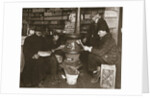 A group of men around a stove in a shop by Anonymous