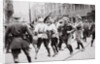 Men in Bolshevik uniform fighting police in the street by Anonymous