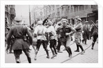 Men in Bolshevik uniform fighting police in the street by Anonymous