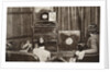 People watching an early television transmission by Anonymous