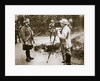 Cameraman filming a wounded soldier by Anonymous