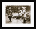 Cameraman filming a wounded soldier by Anonymous