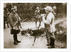 Cameraman filming a wounded soldier by Anonymous