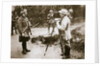 Cameraman filming a wounded soldier by Anonymous