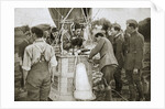 Observer of a kite-balloon testing the telephone before ascending by Anonymous