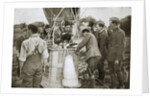 Observer of a kite-balloon testing the telephone before ascending by Anonymous