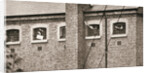Hunger strikers waving to Christabel Pankhurst from their cells in Holloway Prison by Anonymous