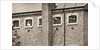 Hunger strikers waving to Christabel Pankhurst from their cells in Holloway Prison by Anonymous