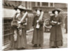 Suffragettes armed with materials to chain themselves to railings by Anonymous