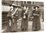 Suffragettes armed with materials to chain themselves to railings by Anonymous