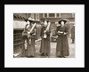 Suffragettes armed with materials to chain themselves to railings by Anonymous