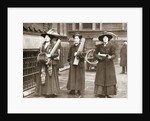 Suffragettes armed with materials to chain themselves to railings by Anonymous
