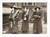 Suffragettes armed with materials to chain themselves to railings by Anonymous