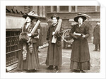 Suffragettes armed with materials to chain themselves to railings by Anonymous