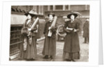 Suffragettes armed with materials to chain themselves to railings by Anonymous