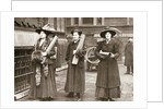 Suffragettes armed with materials to chain themselves to railings by Anonymous