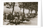 City workers lunching at Tower wharf, seated on old cannons by Anonymous