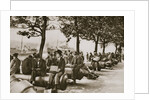 City workers lunching at Tower wharf, seated on old cannons by Anonymous