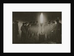 Gathering around an acetylene flare at a traffic control point in the fog by Anonymous