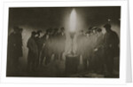 Gathering around an acetylene flare at a traffic control point in the fog by Anonymous