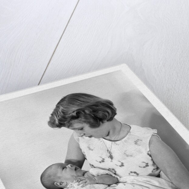 Princess Anne holding Prince Andrew by Cecil Beaton
