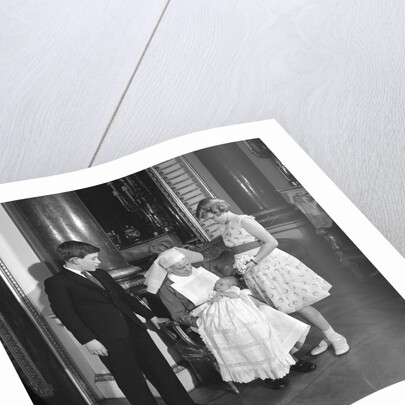 Prince Charles, Princess Anne, Prince Andrew and their nurse by Cecil Beaton