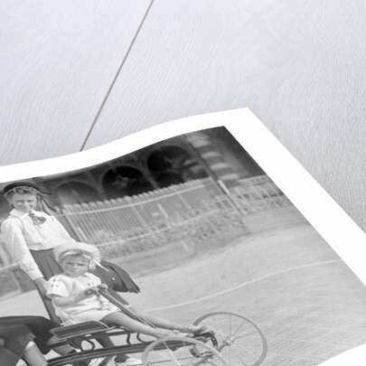 Hand Propelled Four Wheel Tandem on the Seafront by Andrew Pitcairn-Knowles