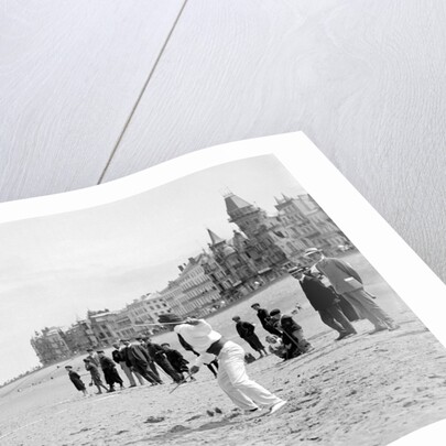 Two Men Throwing Diabolo on Sands by Andrew Pitcairn-Knowles