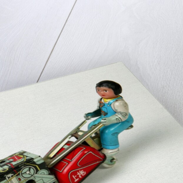 Clockwork toy plough by Unknown