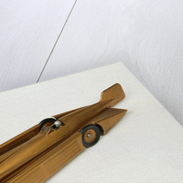Clockwork toy racing car, Golden Arrow Racer by Kingsbury Manufacturing Co