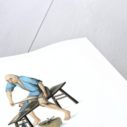 A knife sharpener by Unknown