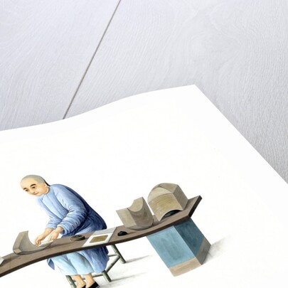 Man making paper ingots by Unknown