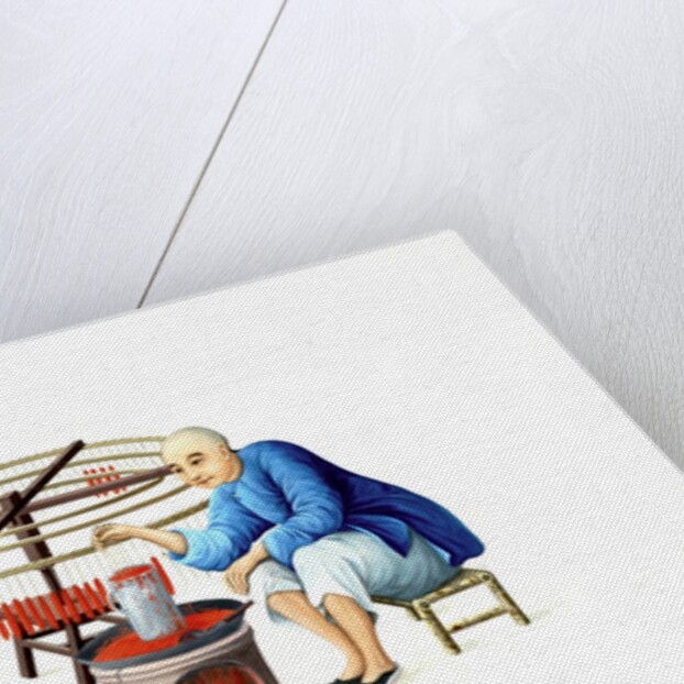 A candle maker by Unknown