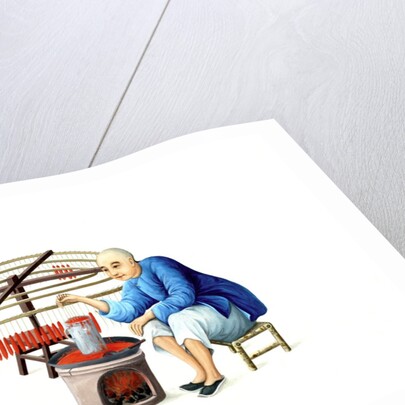 A candle maker by Unknown