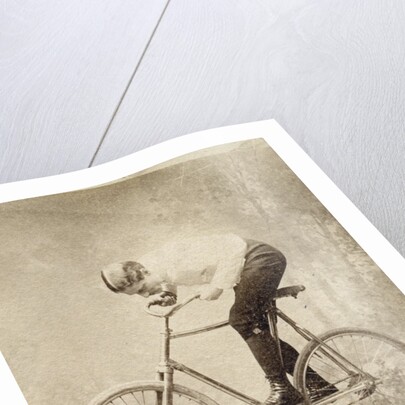 Trick Cyclist Balancing on Candles by Anonymous