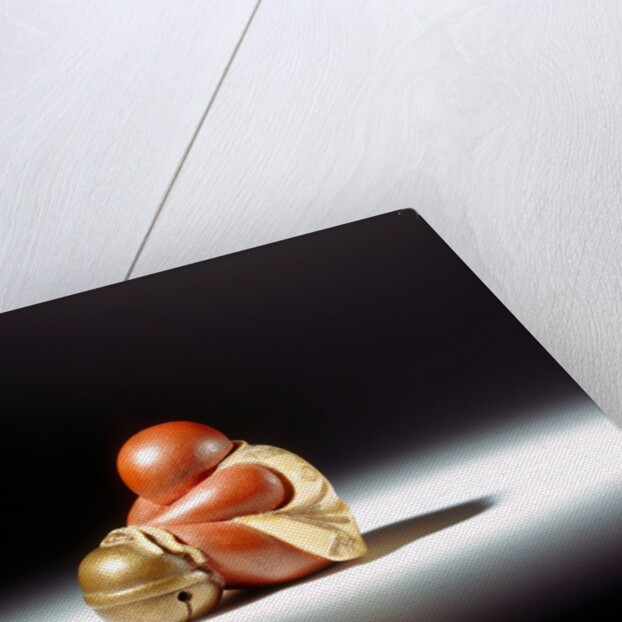 Netsuke abstract doll leaning over a bell by Unknown