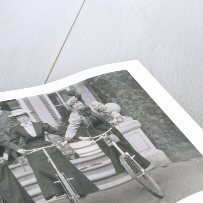 Three Women on Bikes by Unknown