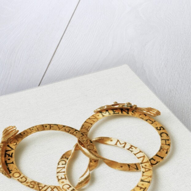 Marriage gimmel ring opened to show each ring by Anonymous