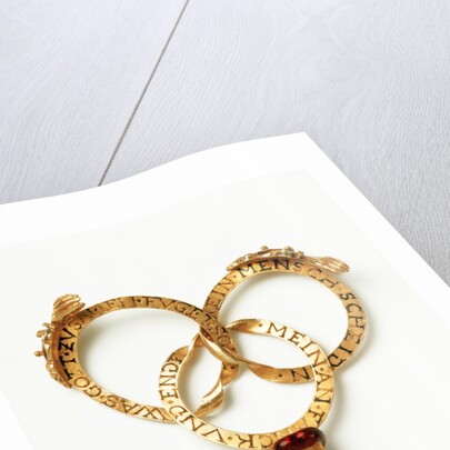 Marriage gimmel ring opened to show each ring by Anonymous