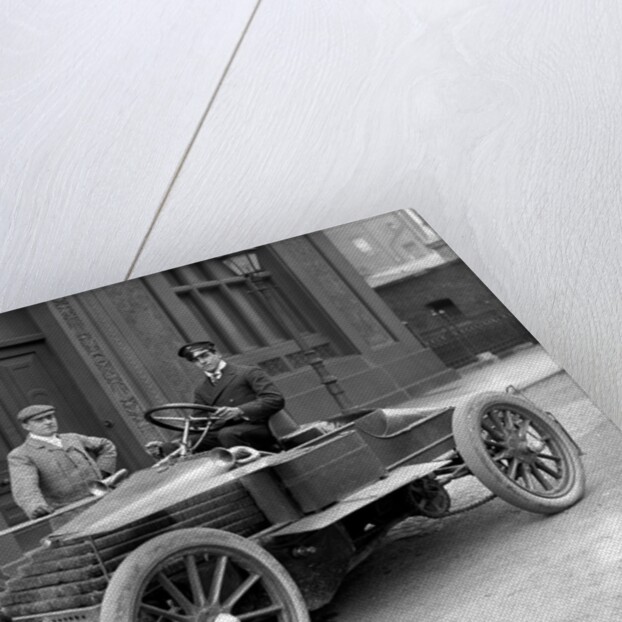 Graham White in racing car by Lafayette Portrait Studios