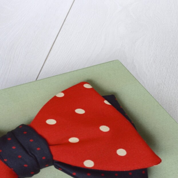 Two contrasting bow ties with poker dot pattern by Turnbull and Asser Ltd.