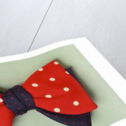 Two contrasting bow ties with poker dot pattern by Turnbull and Asser Ltd.