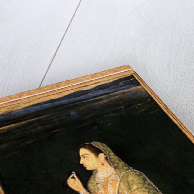 A lady holding a blossom by Unknown