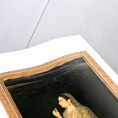 A lady holding a blossom by Unknown