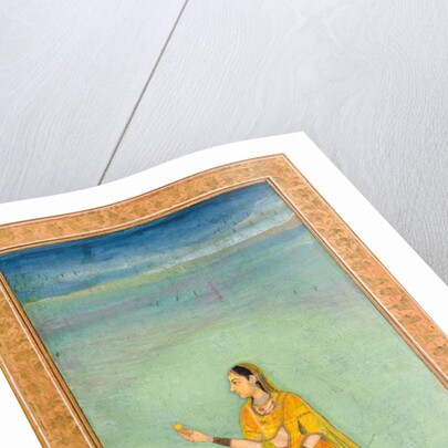 A lady holding a fruit standing by a lily pond by Unknown