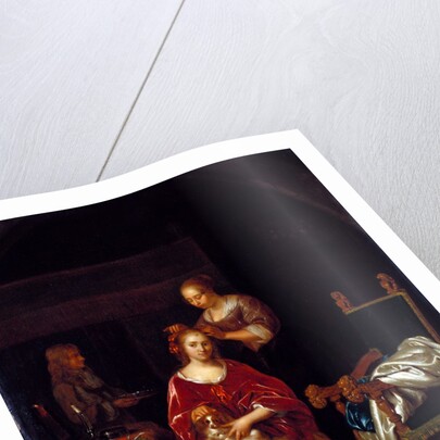 A Lady at her toilet by Caspar Netscher