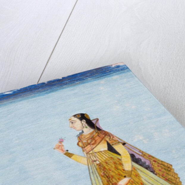 Muslim lady holding a rose by Unknown