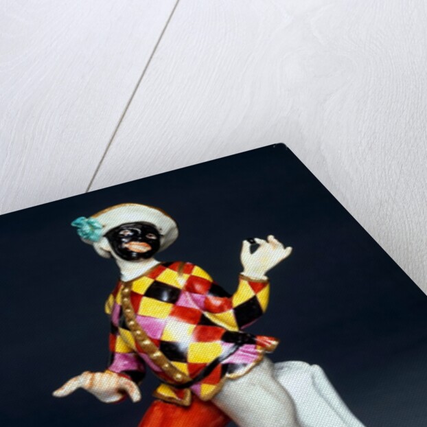 Harlequin holding a black cherry by Johann Joachim Kändler
